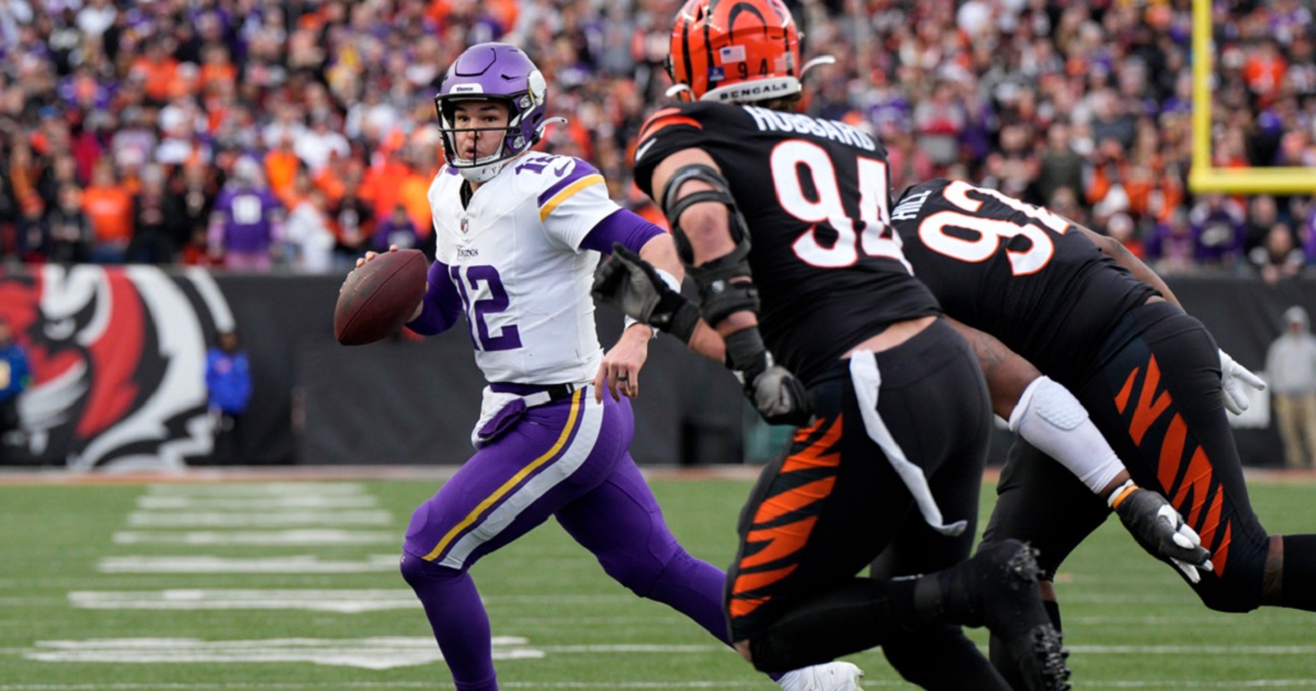 Minnesota Vikings quarterback Nick Mullens scrambles with the ball in the fourth quarter of Saturday's game against the Cincinnati Bengals at Paycor Stadium in Cincinnati. Mullens gave up a costly interception earlier in the game.