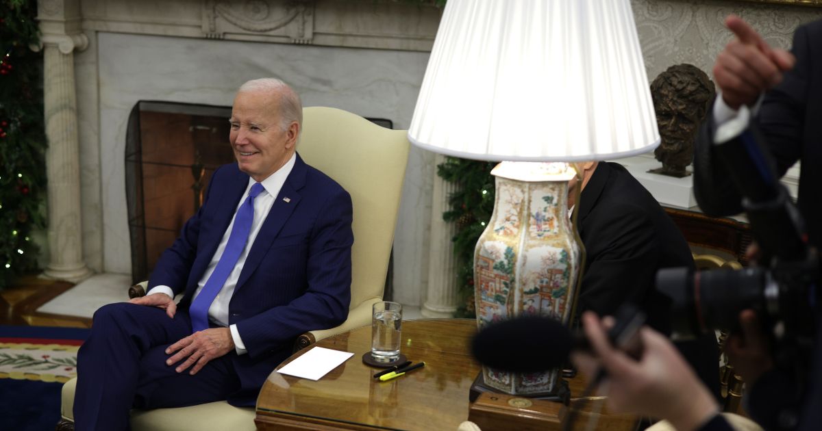 U.S. President Joe Biden attends a meeting with President Joao Lourenco of Angola in the Oval Office of the White House on November 30, 2023 in Washington, DC.