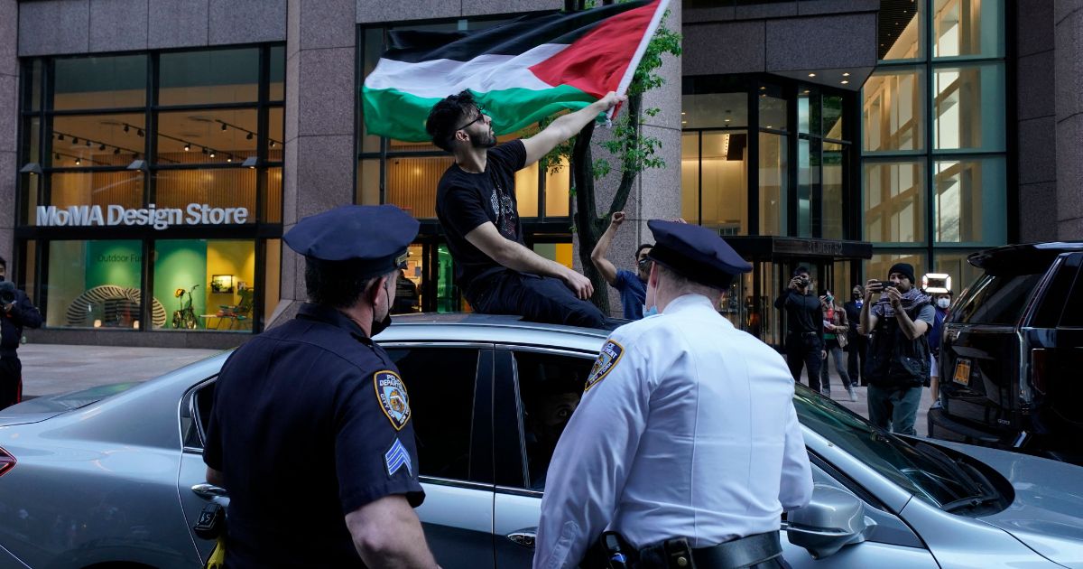 Demonstrators against Israeli violence and in support of Palestinians protest during an "All Eyes on Palestine" rally in New York on May 14, 2021.