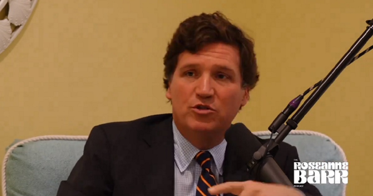 Former Fox News host Tucker Carlson is pictured from in interview on a podcast hosted by actress and comedian Roseanne Barr.