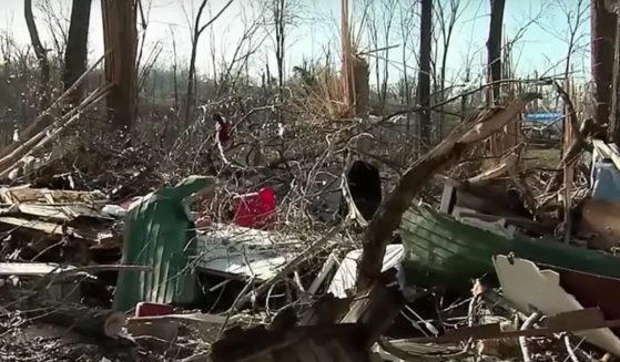 This YouTube screen shot shows the wreckage of a home where an infant was swept up in a tornado in Clarksville, Tennessee, and survived.