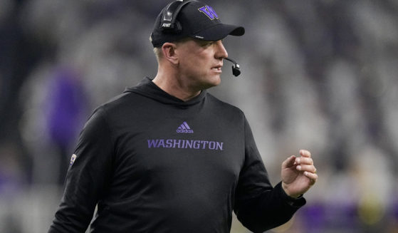 Washington head coach Kalen DeBoer watches during the first half of the national championship NCAA College Football Playoff game against Michigan Monday, Jan. 8 in Houston.