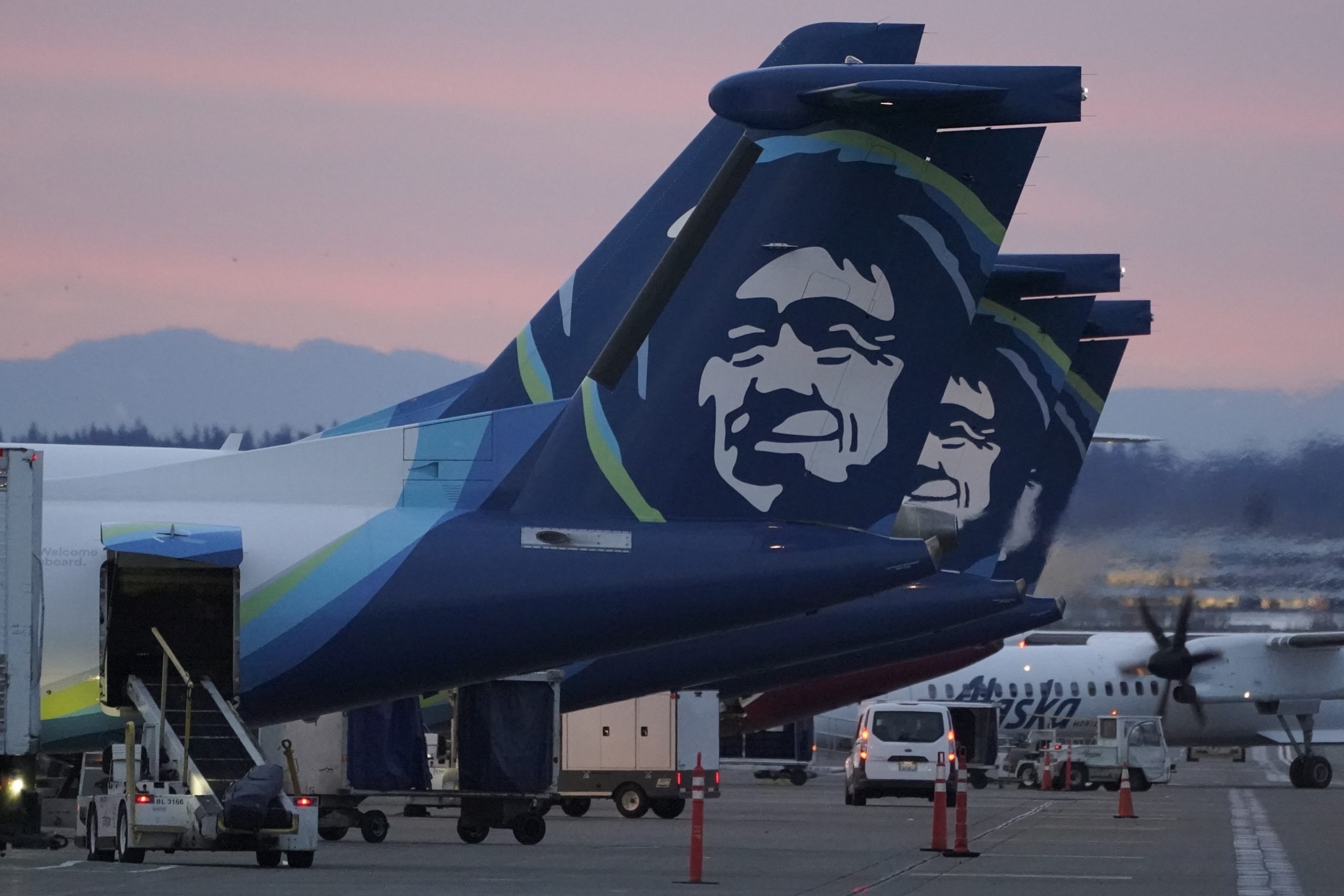 An Alaska Airlines flight made an emergency landing Friday in Oregon after a window and chunk of its fuselage blew out in mid-air, media reports said.