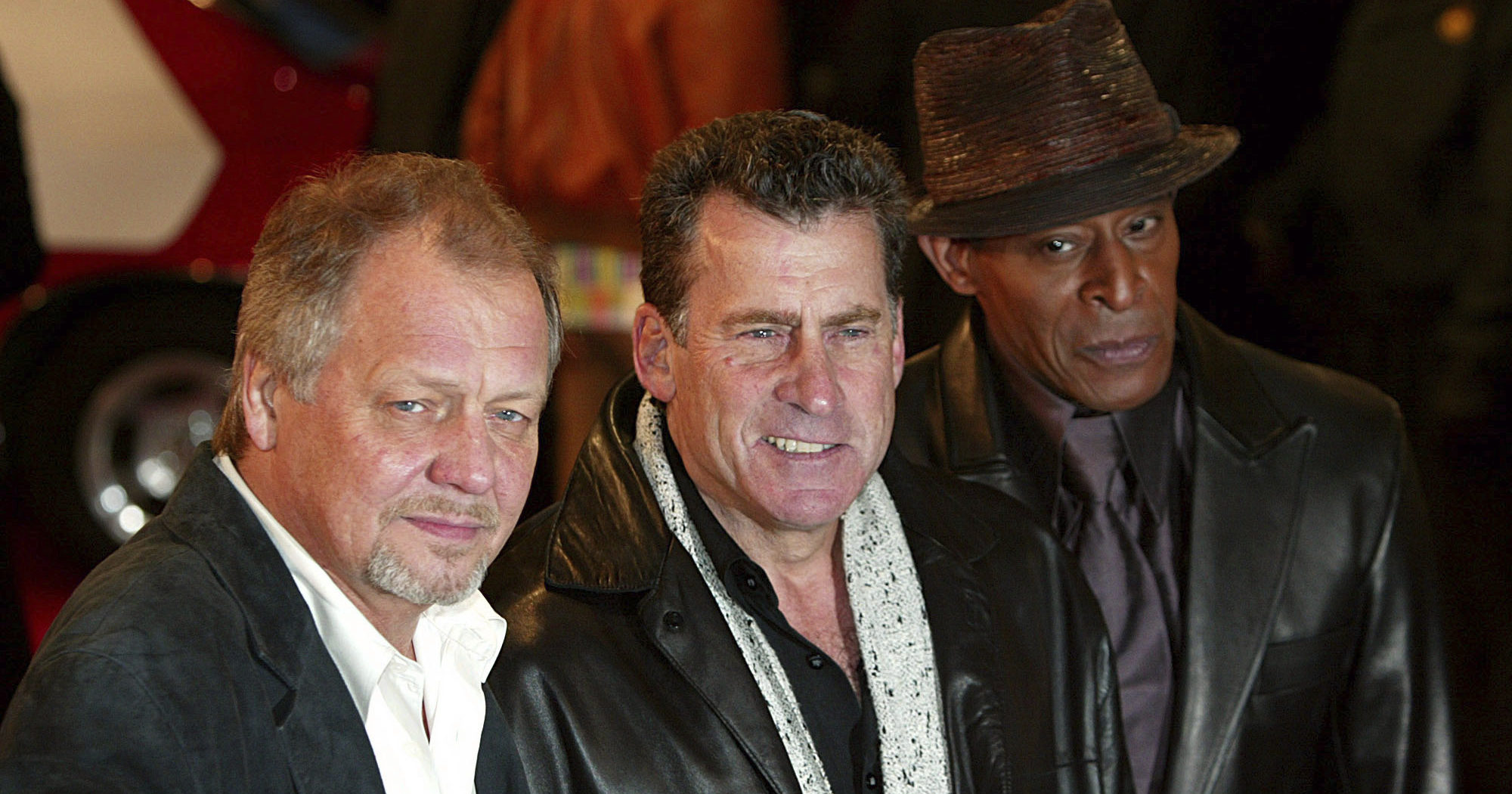 David Soul, left, Paul Michael Glaser, and Antonio Fargas, right, stars of the original 1970's 'Starsky and Hutch' television series arrive at the British premiere of the new movie of the same name based on the TV series in London, on Thursday March 11, 2004.