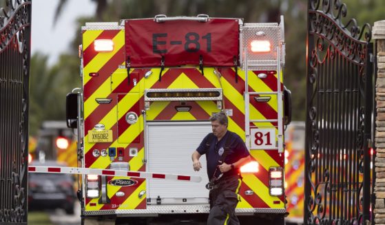 First responders work an active fire at a home belonging to Miami Dolphins wide receiver Tyreek Hill on Wednesday in Southwest Ranches, Florida.