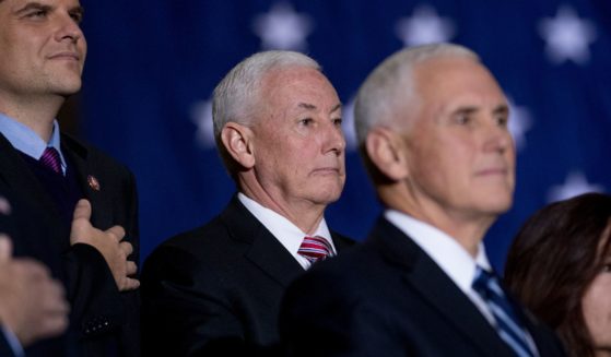 Rep. Matt Gaetz, Rep. Greg Pence, then-Vice President Mike Pence and Karen Pence stand during the playing of the national anthem at Andrews Air Force Base, Maryland, on Dec. 20, 2019.