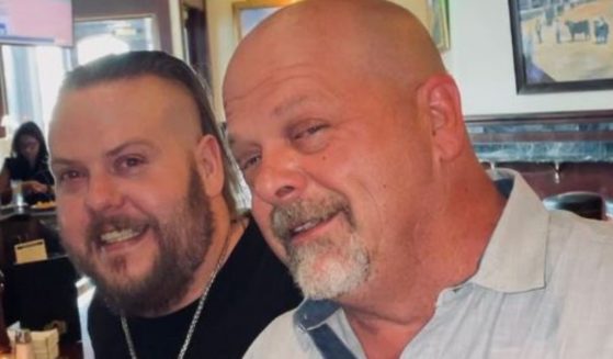 Adam Harrison, left, with his father, Pawn Stars host Rick Harrison.