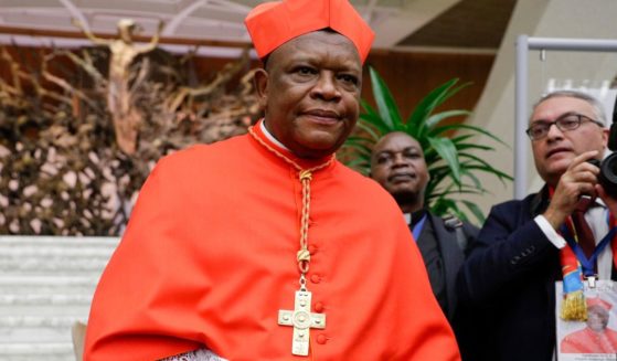 Cardinal Fridolin Among Besungu leaves St. Peter's Basilica, at the Vatican, Oct. 5, 2019. In the greatest rebuke of Pope Francis yet, the Catholic hierarchy of Africa and Madagascar issued a unified statement Thursday, refusing to offer blessings to same-sex couples.
