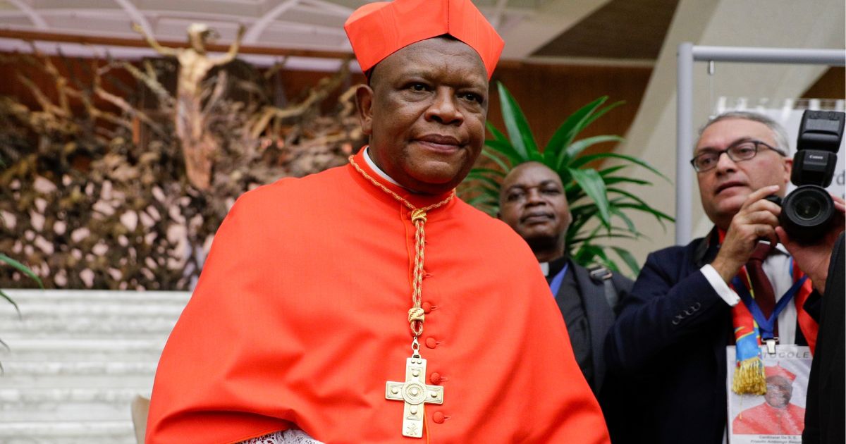 Cardinal Fridolin Among Besungu leaves St. Peter's Basilica, at the Vatican, Oct. 5, 2019. In the greatest rebuke of Pope Francis yet, the Catholic hierarchy of Africa and Madagascar issued a unified statement Thursday, refusing to offer blessings to same-sex couples.