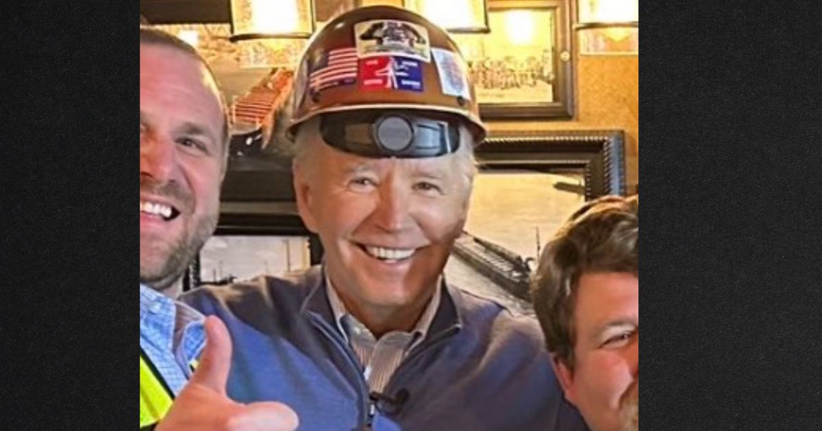 A photo of President Joe Biden posing in a hard hat with workers was evidently meant to show his relatability, but that point was lost when social media users observed he had put the hard hat on backward.
