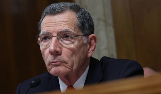 Republican Sen. John Barrasso of Wyoming looks on during a hearing in Washington on May 2.