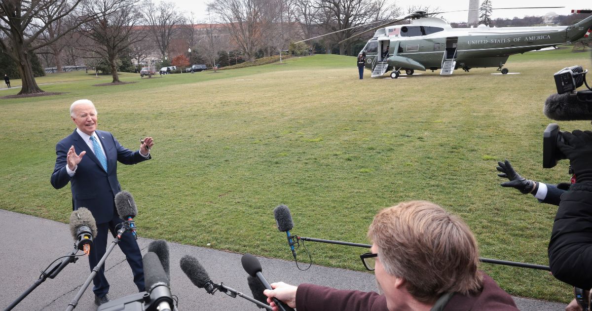 President Joe Biden answers questions on the South Lawn of the White House in Washington before boarding Marine One on Tuesday morning.