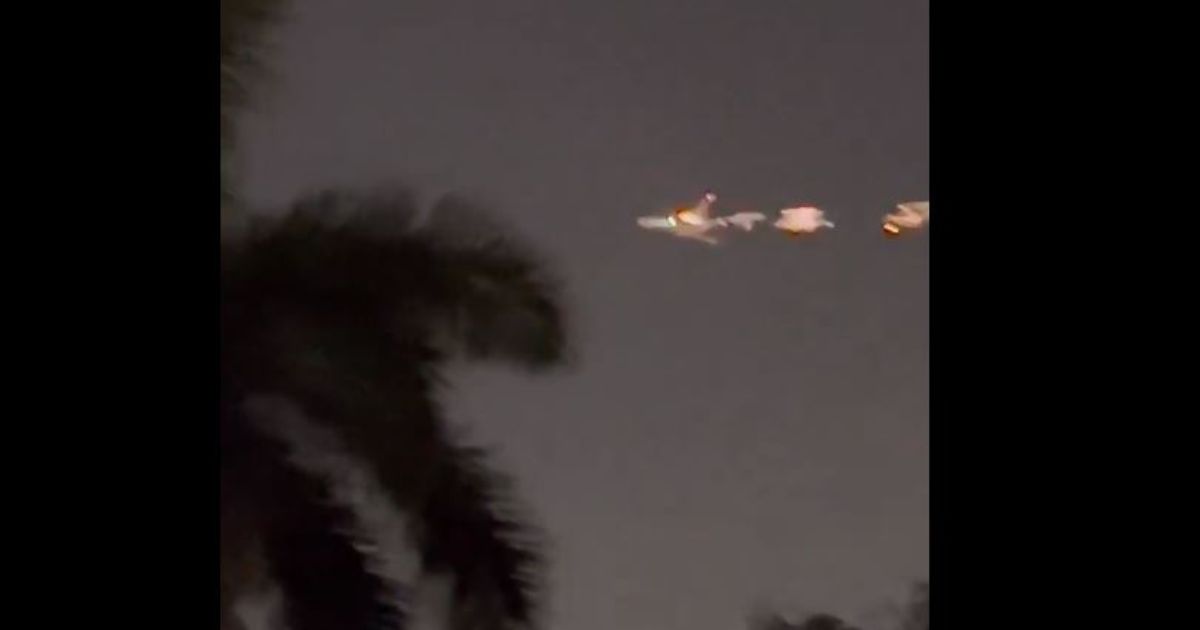 An unverified image posted on X reportedly shows a Boeing 747 cargo plane experiencing an engine fire Thursday just after takeoff in Miami.