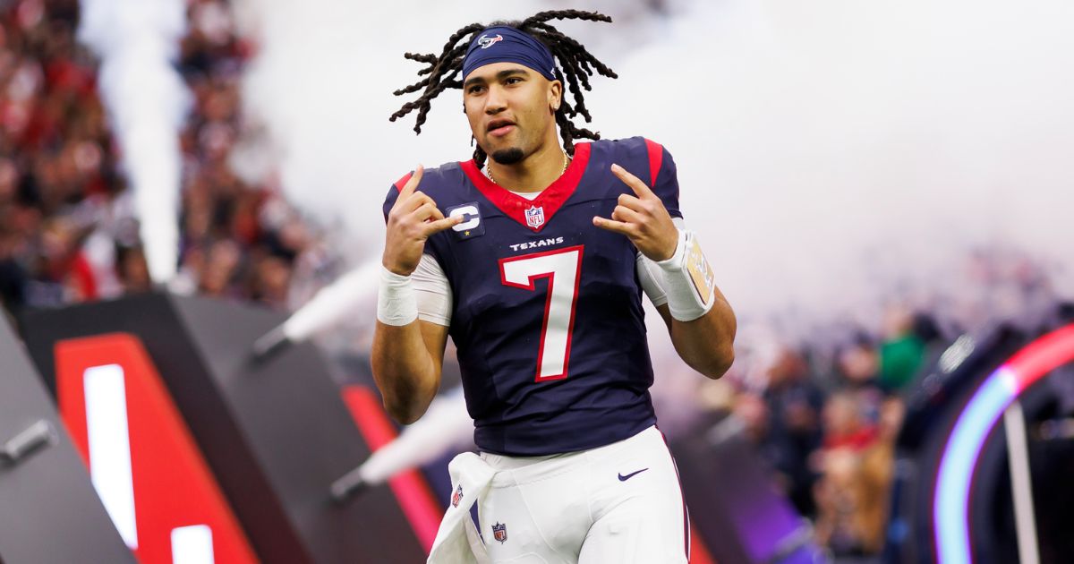 C.J. Stroud of the Houston Texans celebrates as he runs onto the field during player introductions before an AFC wild-card playoff football game against the Cleveland Browns in Houston on Jan. 13.