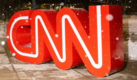 Snow falls on the CNN logo outside the fifth Republican presidential primary debate in Des Moines, Iowa, on Jan. 10.