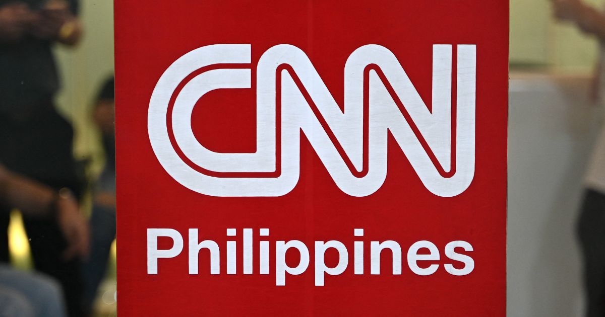The logo of CNN Philippines is seen outside their office in Mandaluyong, Metro Manila on Monday. The CNN Philippines officially announced that it will stop news production operations effective on January 31, as a result of "serious financial losses."
