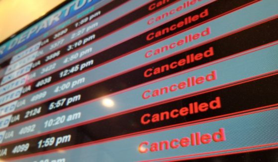 A flight departures board shows all flights canceled during a 2018 snow event at Newark International Airport in Newark, New Jersey.