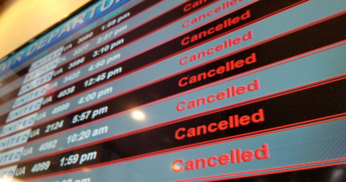 A flight departures board shows all flights canceled during a 2018 snow event at Newark International Airport in Newark, New Jersey.