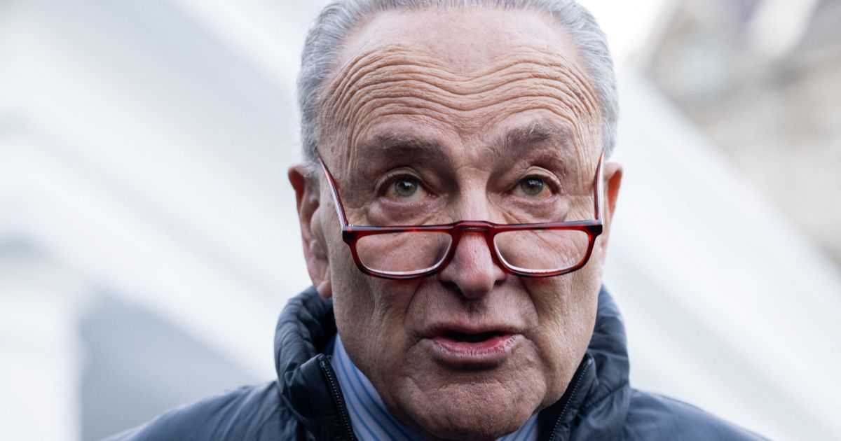 Senate Majority Leader Chuck Schumer speaks to reporters following a meeting with President Joe Biden about government funding outside the White House in Washington, D.C., on Jan. 17.
