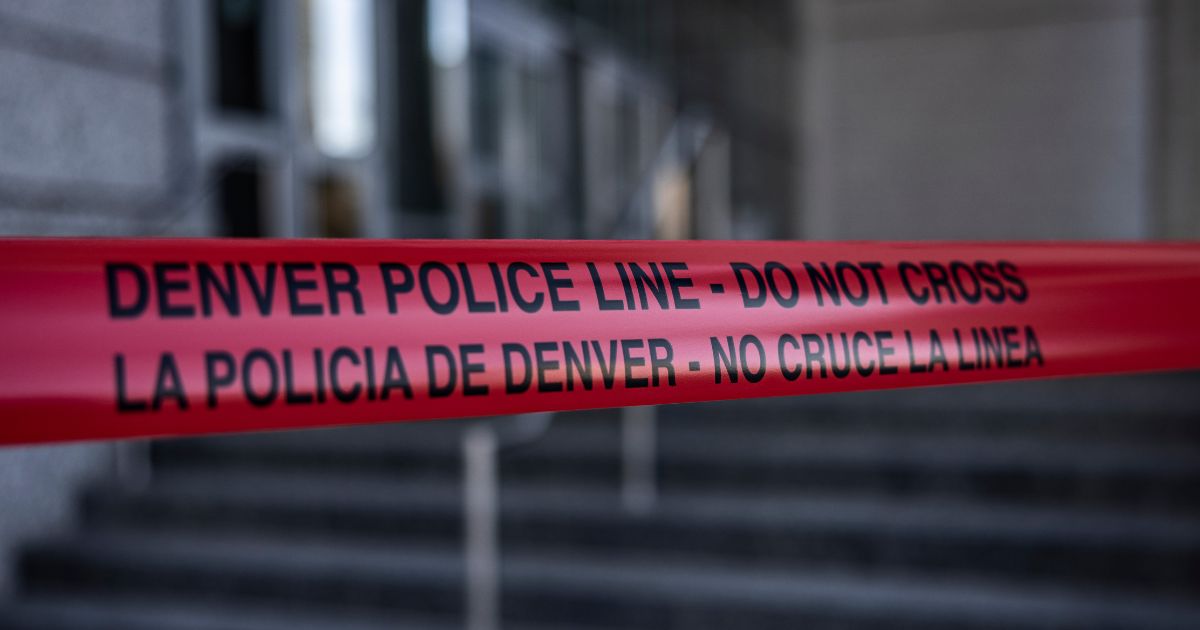 Caution tape surrounds the entrance to the Ralph L. Carr Colorado Judicial Center, home of the Colorado Supreme Court, on Tuesday.