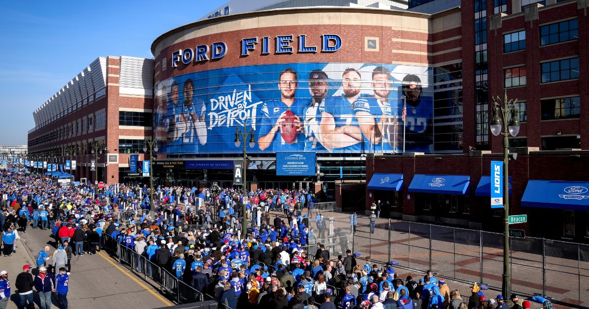Fans enter the stadium prior to the game between the Detroit Lions and the Buffalo Bills in Detroit, Michigan, on Nov. 24, 2022.