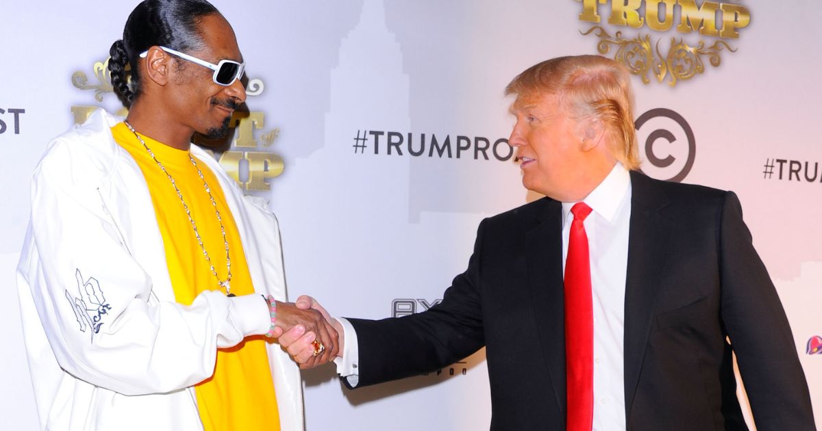 Snoop Dogg and Donald Trump shake hands at the Comedy Central Roast of Donald Trump at the Hammerstein Ballroom in New York City on March 9, 2011.