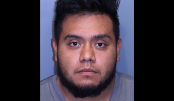 Erik Santillan is charged with aggravated rape.