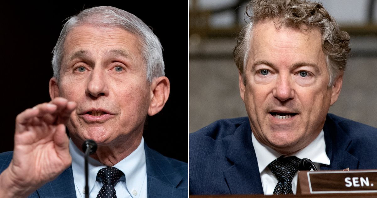 Dr. Anthony Fauci, left, responds to questions from GOP Sen. Rand Paul, right, during a hearing on Capitol Hill in Washington Jan. 11, 2022.