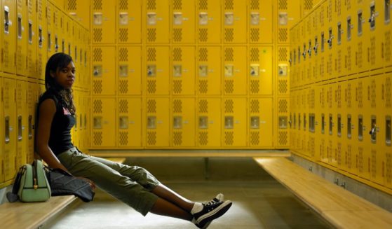 This stock image pictures a teenage girl in a female locker room of a high school. A West Virginia mother recently argued against a school board for allowing males who claim to be transgender access to the female locker rooms.