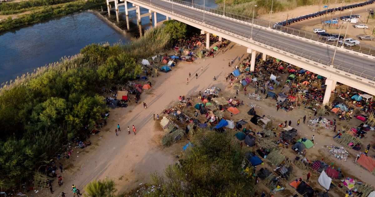 Illegal Immigrants, many from Haiti, are seen at an encampment along the Del Rio International Bridge near the Rio Grande in Del Rio, Texas, on Sept. 21, 2021.