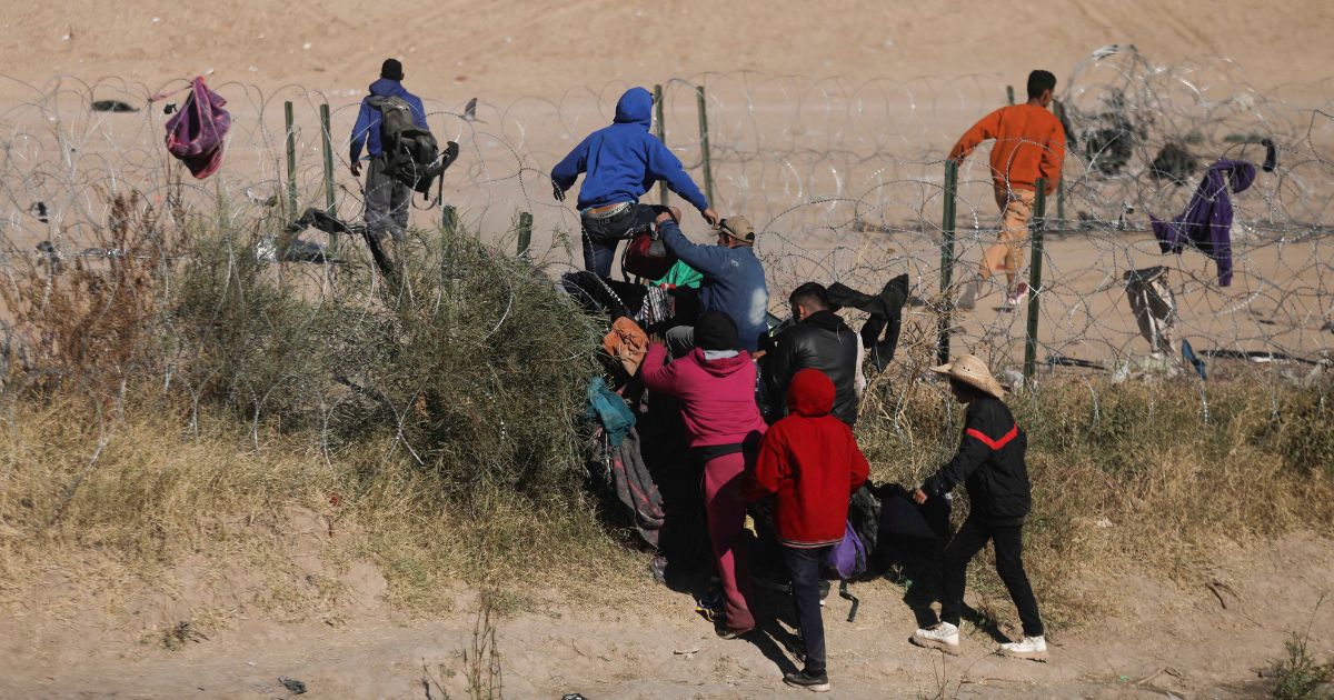 Illegal immigrants arrive at the border between Mexico and the U.S. in Ciudad Juarez, Mexico, on Dec. 28.