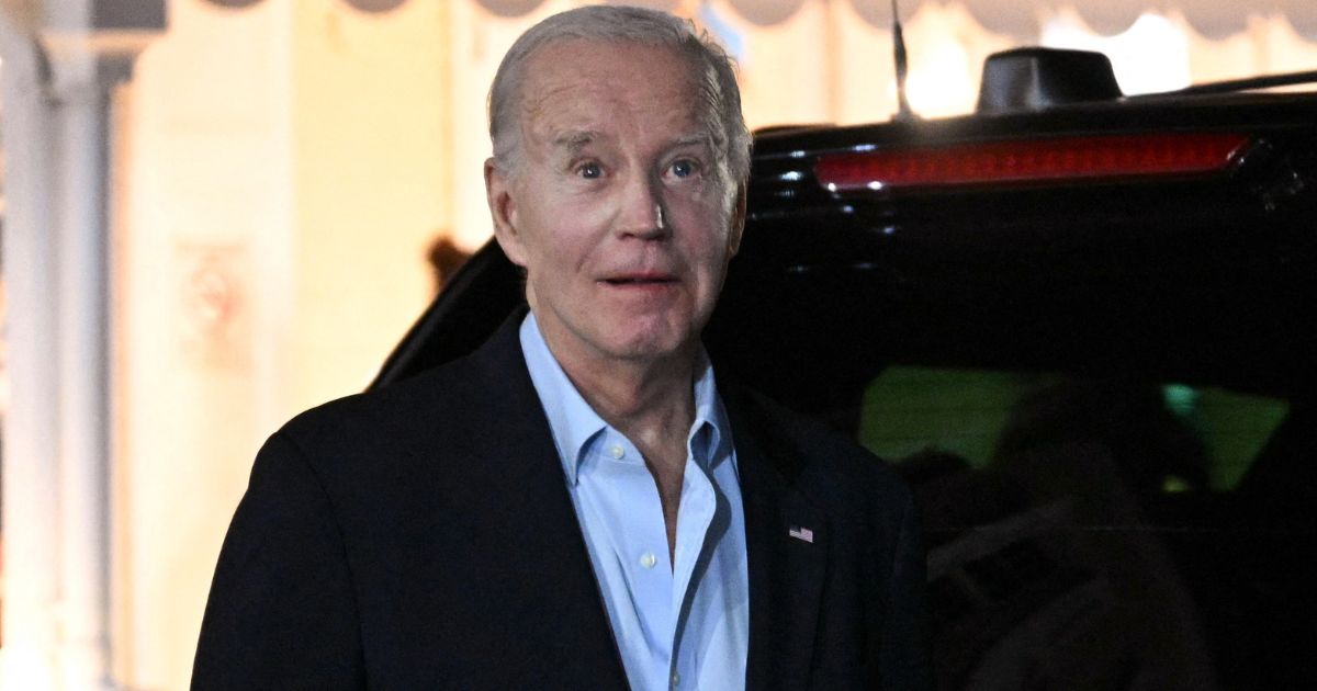 President Joe Biden steps out of a restaurant after dining in Christiansted in Saint Croix on the U.S. Virgin Islands on Saturday.