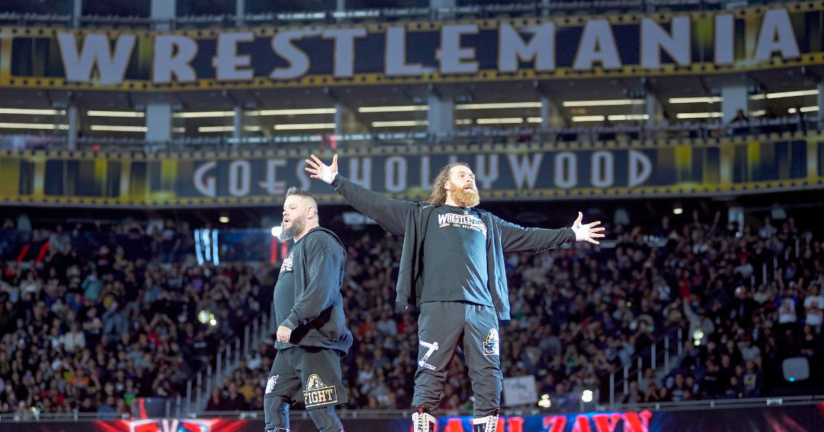 Wrestlers Kevin Owens and Sami Zayn performing at WrestleMania 39.