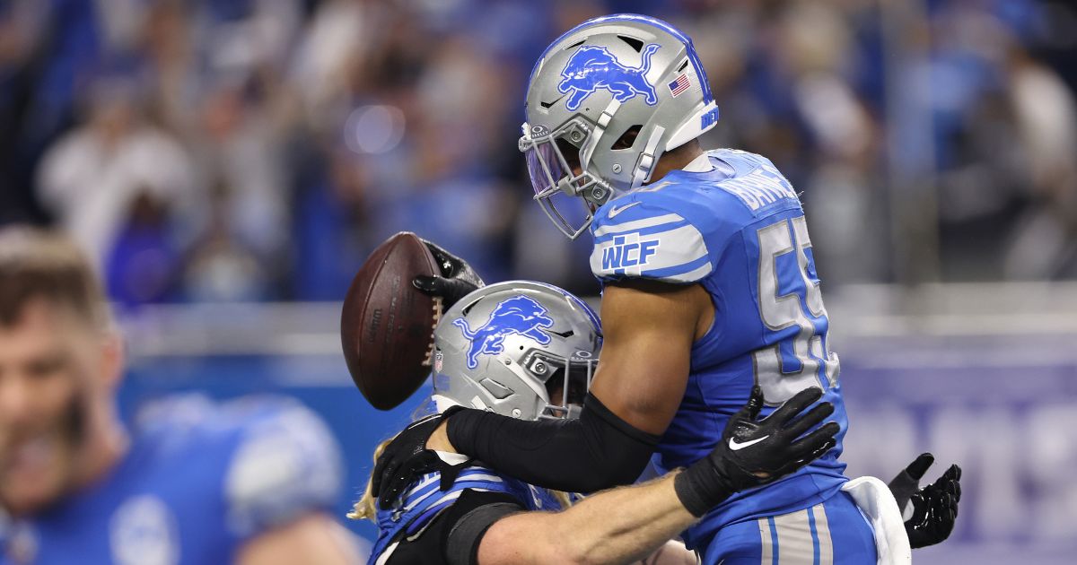 Detroit Lions linebacker Derrick Barnes celebrates after a game-sealing interception against the Tampa Bay Buccaneers in a divisional-round playoff game at Ford Field in Detroit on Sunday.