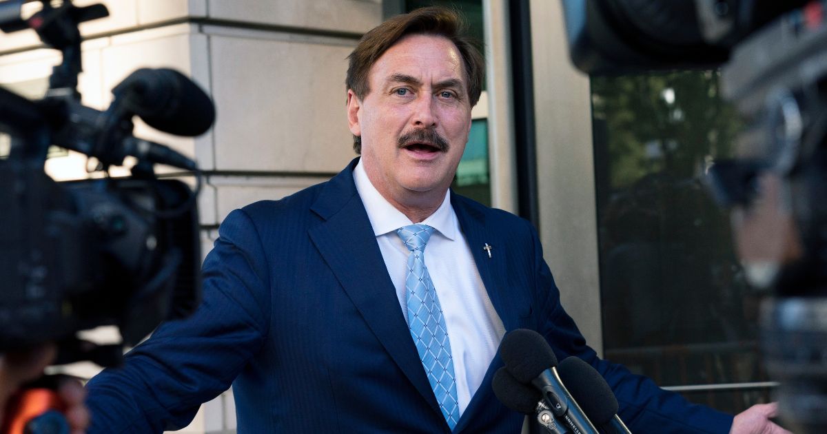Mike Lindell speaks to reporters outside federal court in Washington on June 24, 2021.