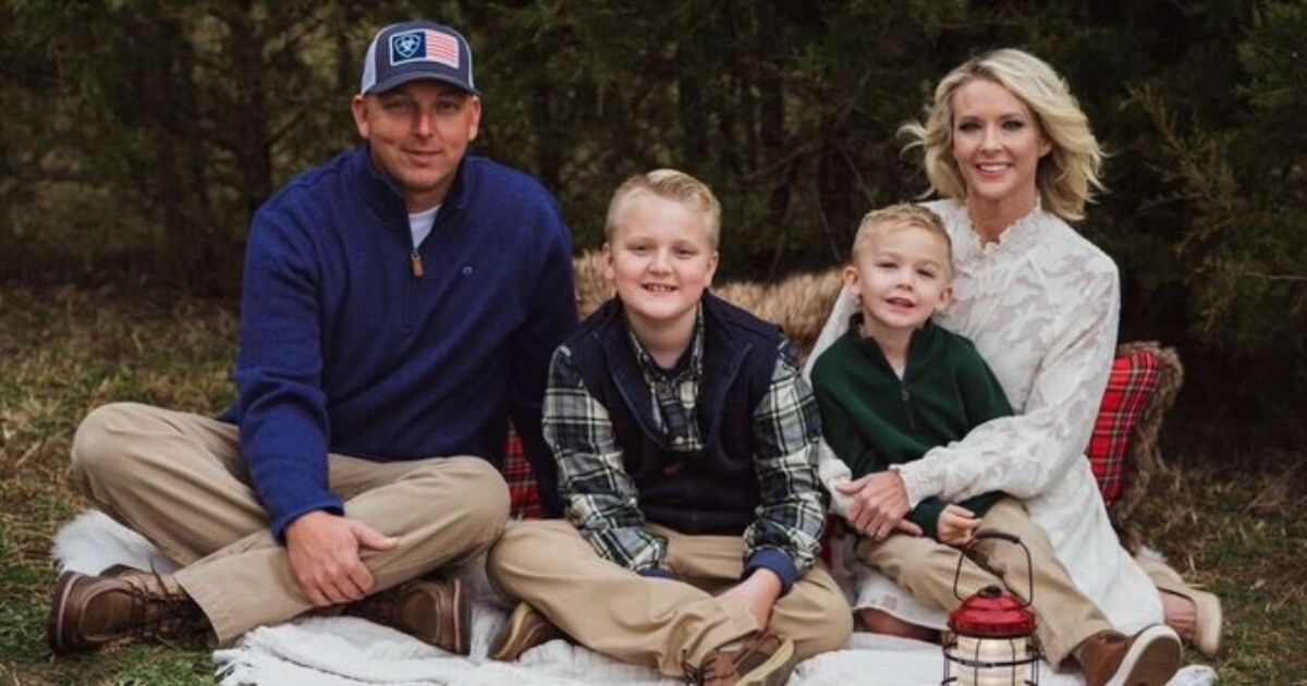 Cindy Mullins is seen with her husband and sons.