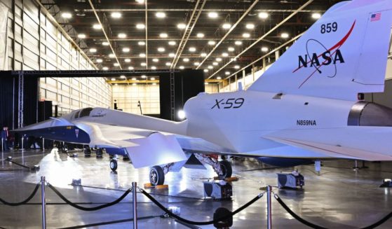 NASA's and Lockheed Martin's X-59 experimental supersonic jet is unveiled during a ceremony Friday in Palmdale, California.