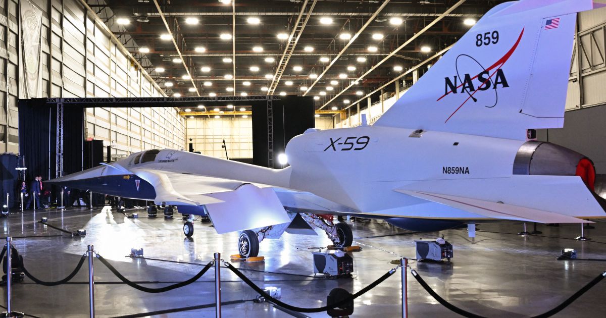 NASA's and Lockheed Martin's X-59 experimental supersonic jet is unveiled during a ceremony Friday in Palmdale, California.