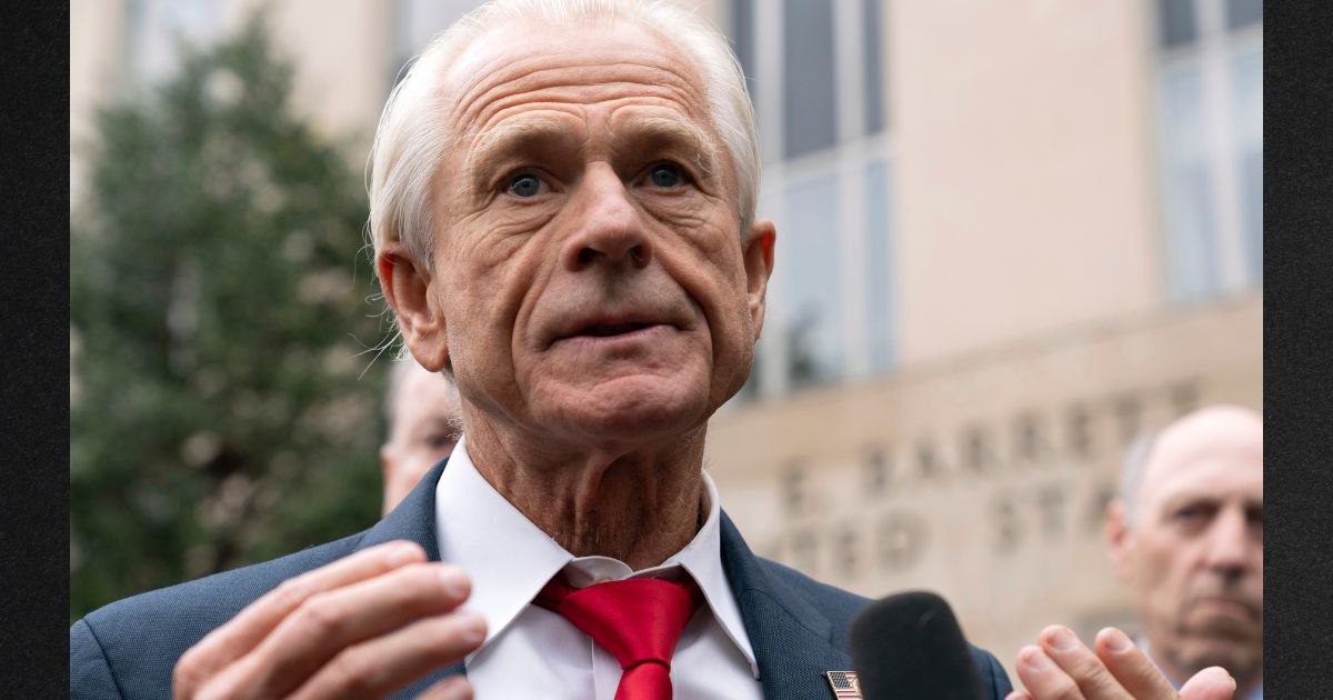 Former Trump White House official Peter Navarro talks to the media as he leaves the U.S. Federal Courthouse in Washington Thursday. Navarro, who was convicted of contempt of Congress for refusing to cooperate with a congressional investigation into the Jan. 6, 2021, Capitol incursion, was sentenced Thursday to four months behind bars.