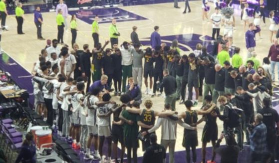 On Jan. 16, the Kansas State Wildcats men’s basketball team upset the ninth-ranked Baylor Bears in overtime, 68-64. Then, players and staff members from both teams came together in a circle to pray.