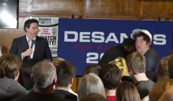 An environmental activist attempted to rush the stage at a Ron DeSantis campaign event in Ames, Iowa, on Thursday.