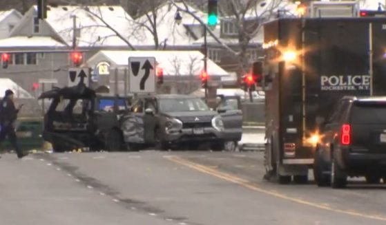 Police work the scene of the crash in Rochester, New York.