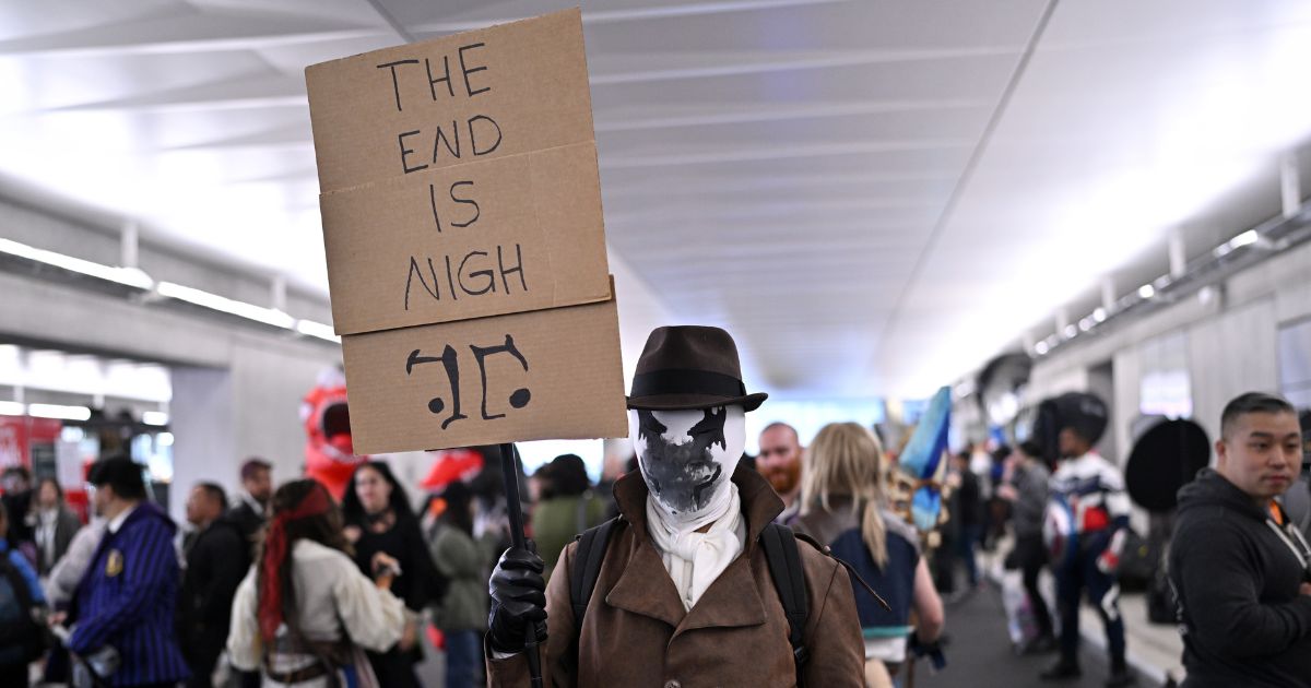 A cosplayer poses as Rorschach from Watchmen during New York Comic Con 2023 - Day 3 at Javits Center on October 14, 2023 in New York City.