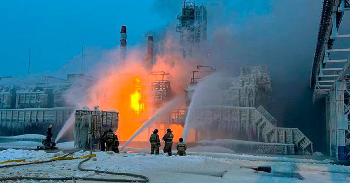 Firefighters extinguish a blaze Sunday at Russia's second-largest natural gas producer, Novatek, in Ust-Luga, about 100 miles southwest of St. Petersburg.
