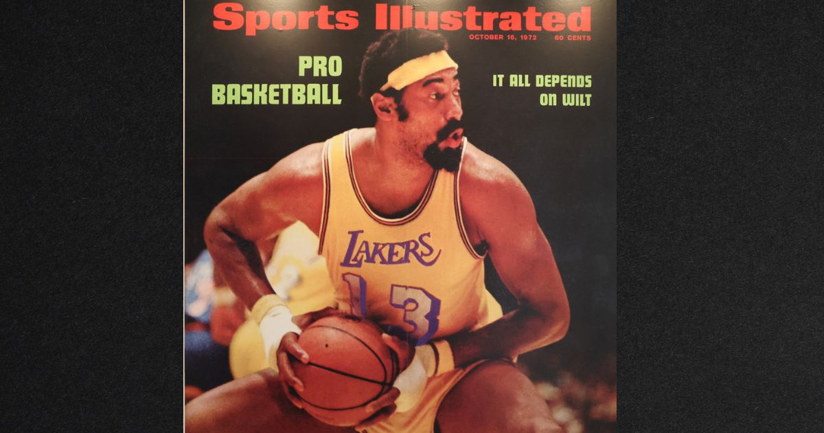 An October 16, 1972 Sports Illustrated cover featuring Wilt Chamberlain is seen on display at Sotheby's Auction House on August 1, 2023, in Los Angeles, California. The sports magazine, which is nearly 70 years old, laid off virtually all its staff Friday.