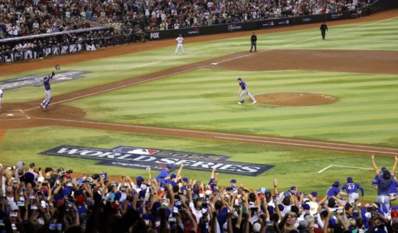 The Texas Rangers celebrate after beating the Arizona Diamondbacks to win the World Series at Chase Field on Nov. 1, 2023, in Phoenix.