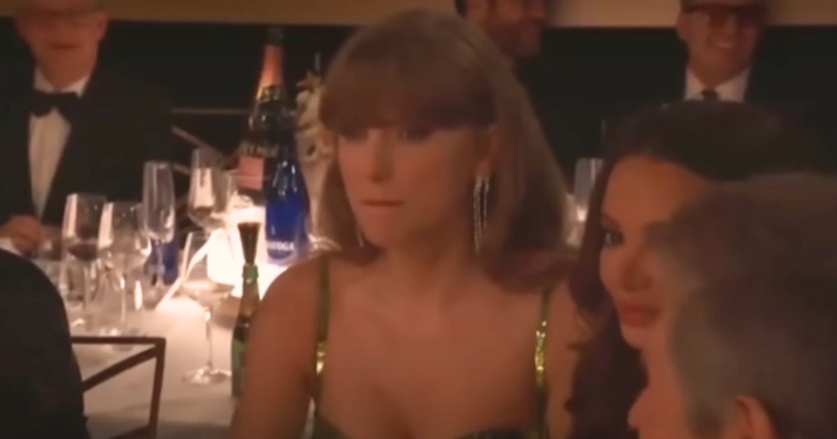 Taylor Swift was unamused after the host made a joke at her expense Sunday during the Golden Globes awards ceremony.