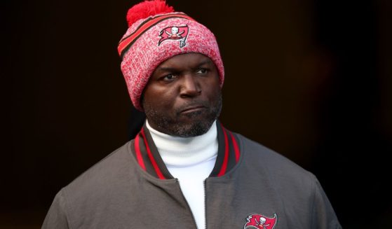Tampa Bay Buccaneers head coach Todd Bowles walks onto the field before the game against the Carolina Panthers in Charlotte, North Carolina, on Jan. 7.