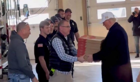 Former President Donald Trump delivered pizza to firefighters at the Waukee Fire Department in Waukee, Iowa, on Sunday.