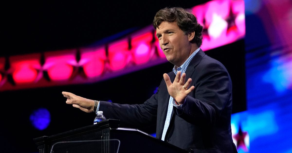 Tucker Carlson speaks at the Turning Point Action conference, July 15, in West Palm Beach, Florida.
